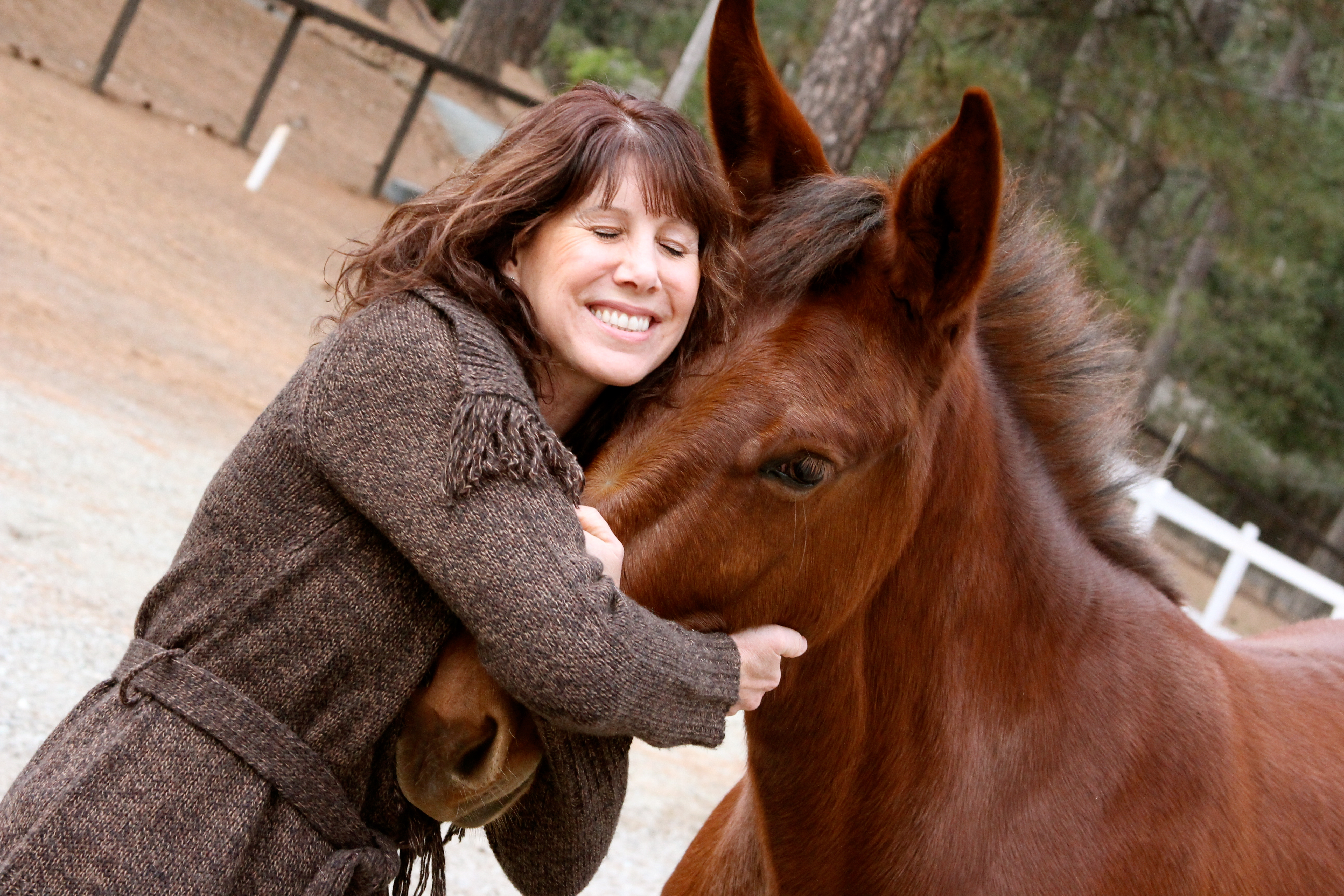 Chris Pauley hugging her beloved Horse Frankie
