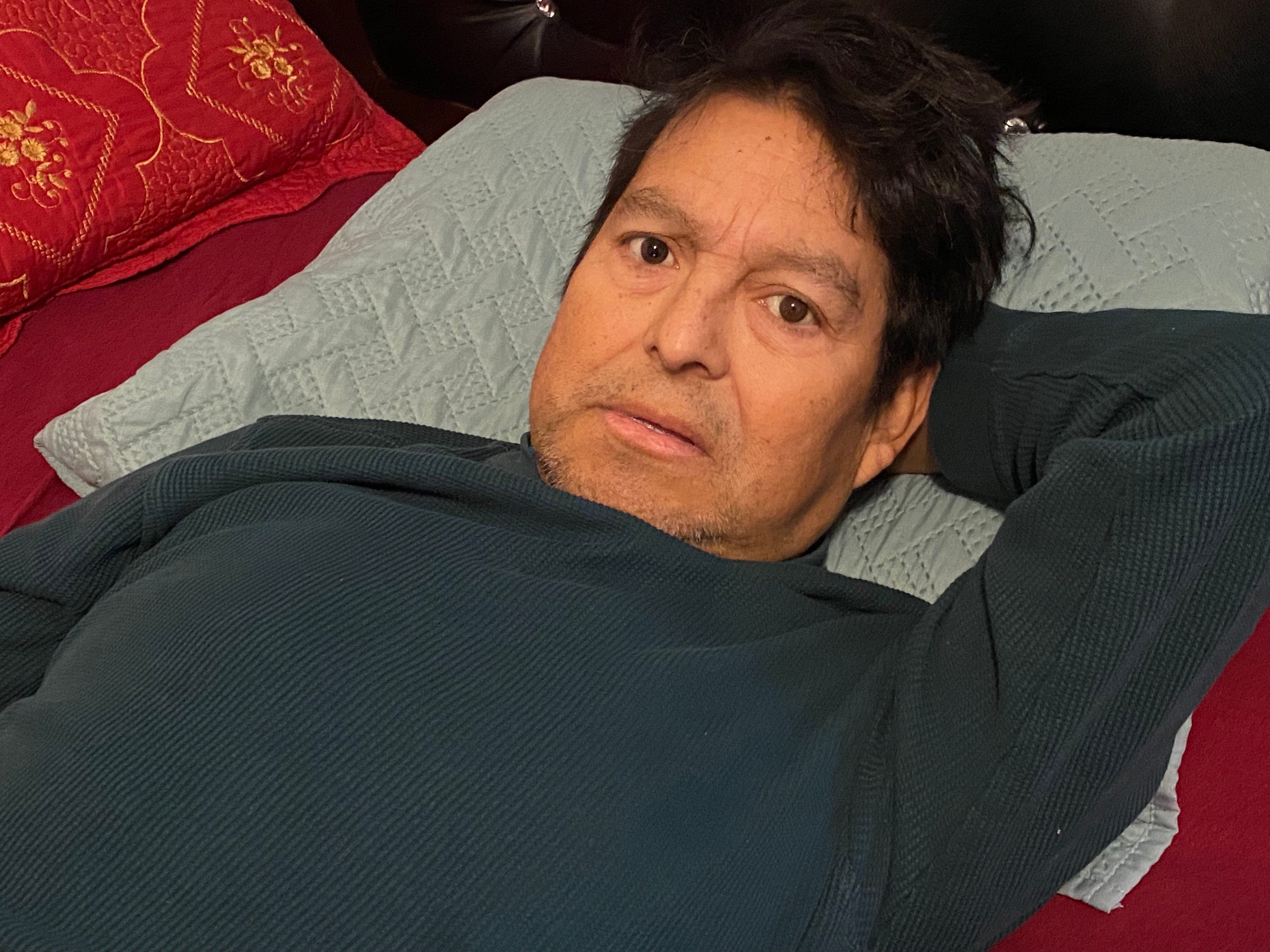 Jose Alejandro Lemuz laying on a pillow
