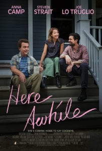 Actress Anna Camp sits on the set of Here Awhile with her co-stars.