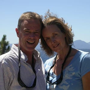 James Mulligan and his wife Alice Mulligan in front of mountains