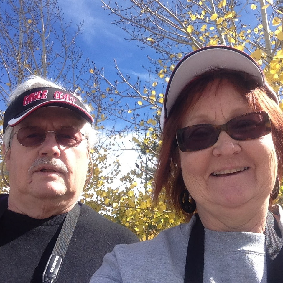 Ron Dickey and his wife Linda outside on a hike